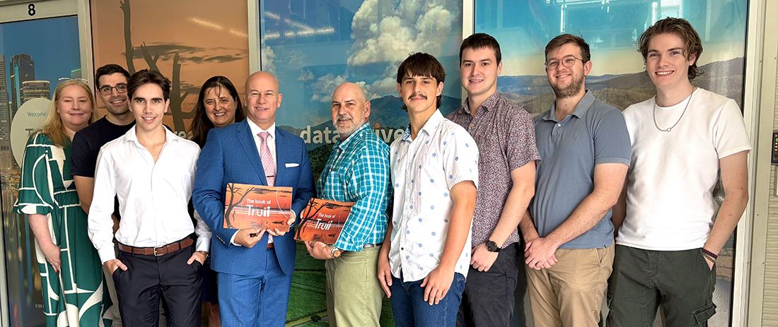 Hon Steve Minnikin, Minister for Customer Services, Open Data and Minister for Small and Family Business, pictured with some of the Truii team.