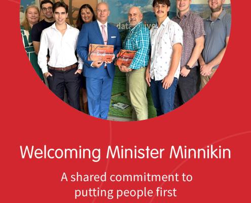 Hon Steve Minnikin, Minister for Customer Services, Open Data and Minister for Small and Family Business, pictured with some of the Truii team.